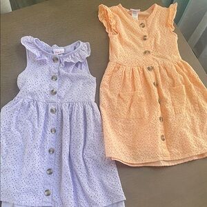 EUC .Pair of little girl orange and purple eyelet dresses